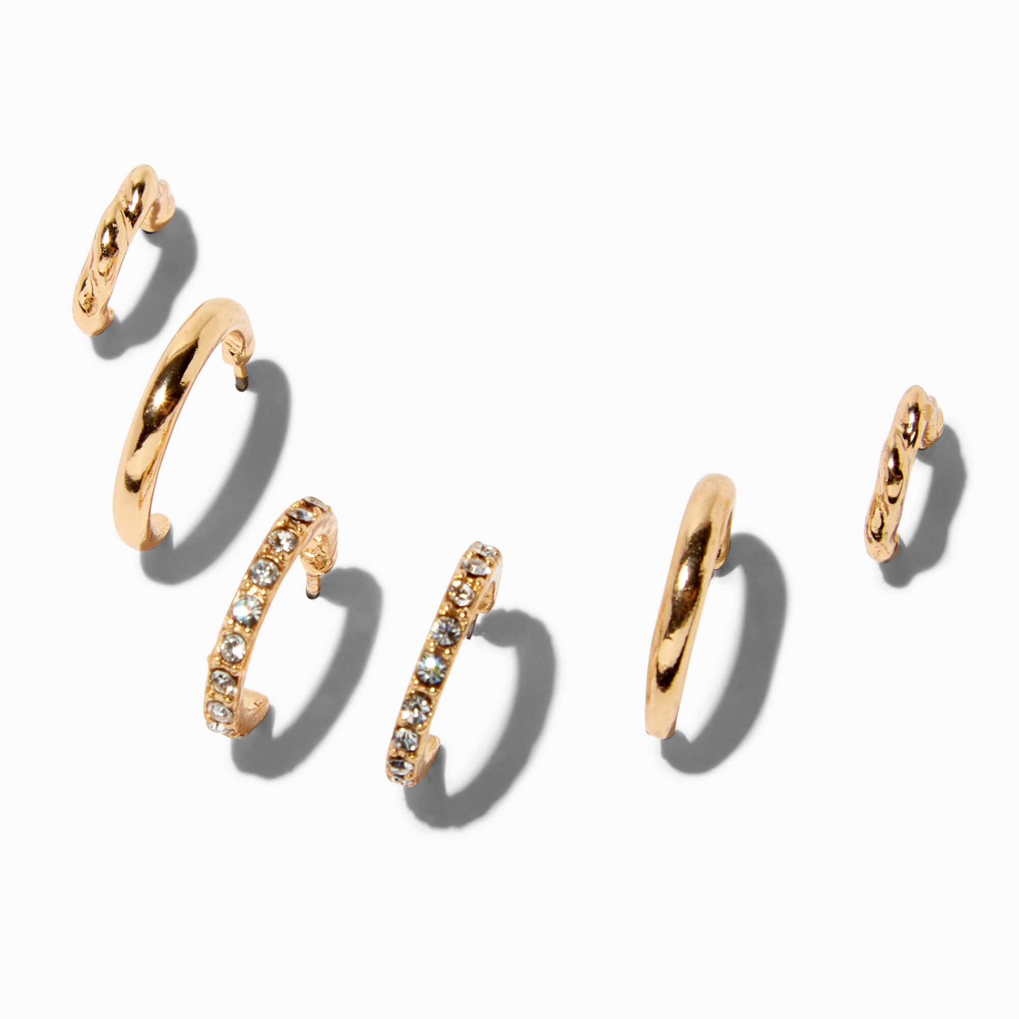 View Claires Tone Graduated Embellished Huggie Hoop Earring Stackables Set 3 Pack Gold information