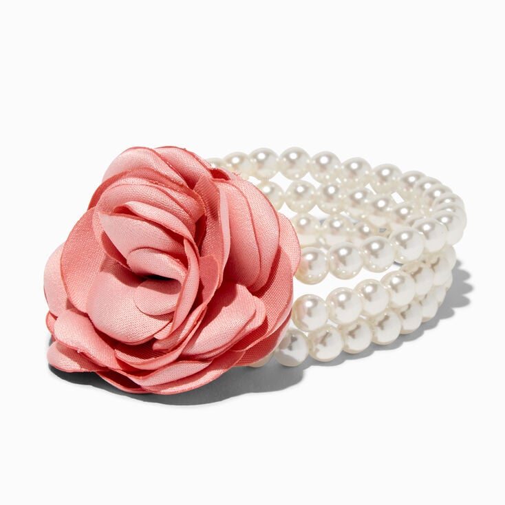 Bracelet &eacute;lastique multi-rangs perles d&rsquo;imitation et petit bouquet de rosettes roses,