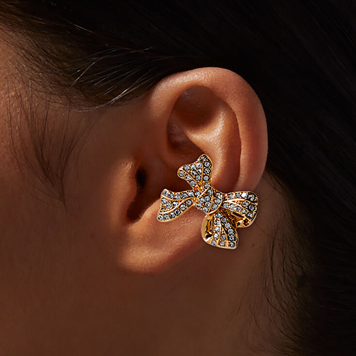 Manchette d&#39;oreille n&oelig;ud pav&eacute; strass couleur dor&eacute;e,