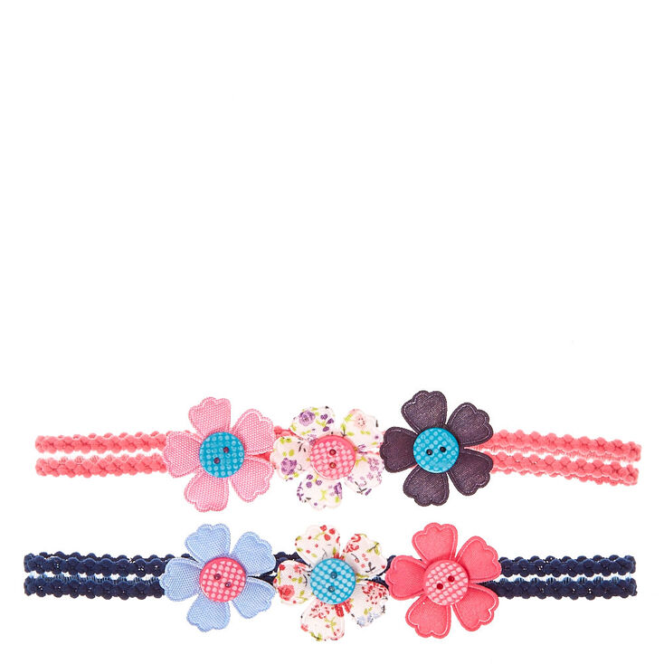 Bandeau avec boutons en forme de fleurs,