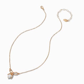 Collier &agrave; pendentif perle d&rsquo;imitation c&oelig;ur et n&oelig;ud couleur dor&eacute;e,