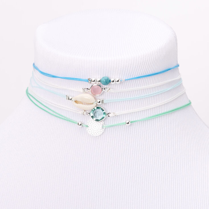 Claire's Ras-du-cou strass et coquillages en filigrane couleur argentée - Bleu, lot de 5