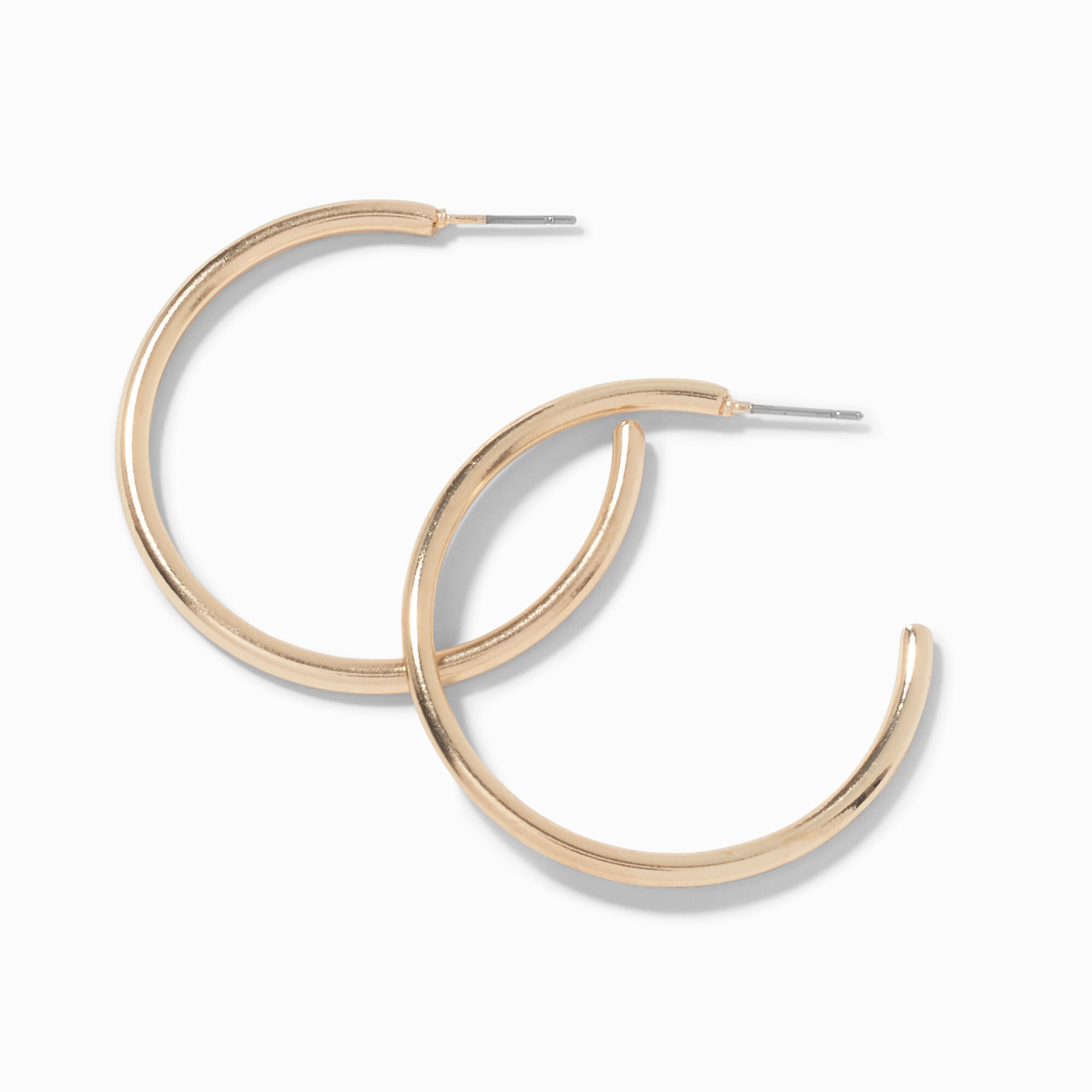 View Claires Tone 20MM Tubular Hoop Earrings Gold information