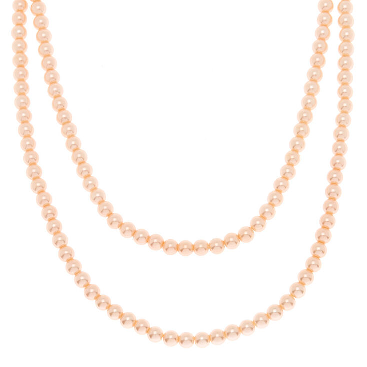 Claire's Long collier avec perles d’imitation rose tendre