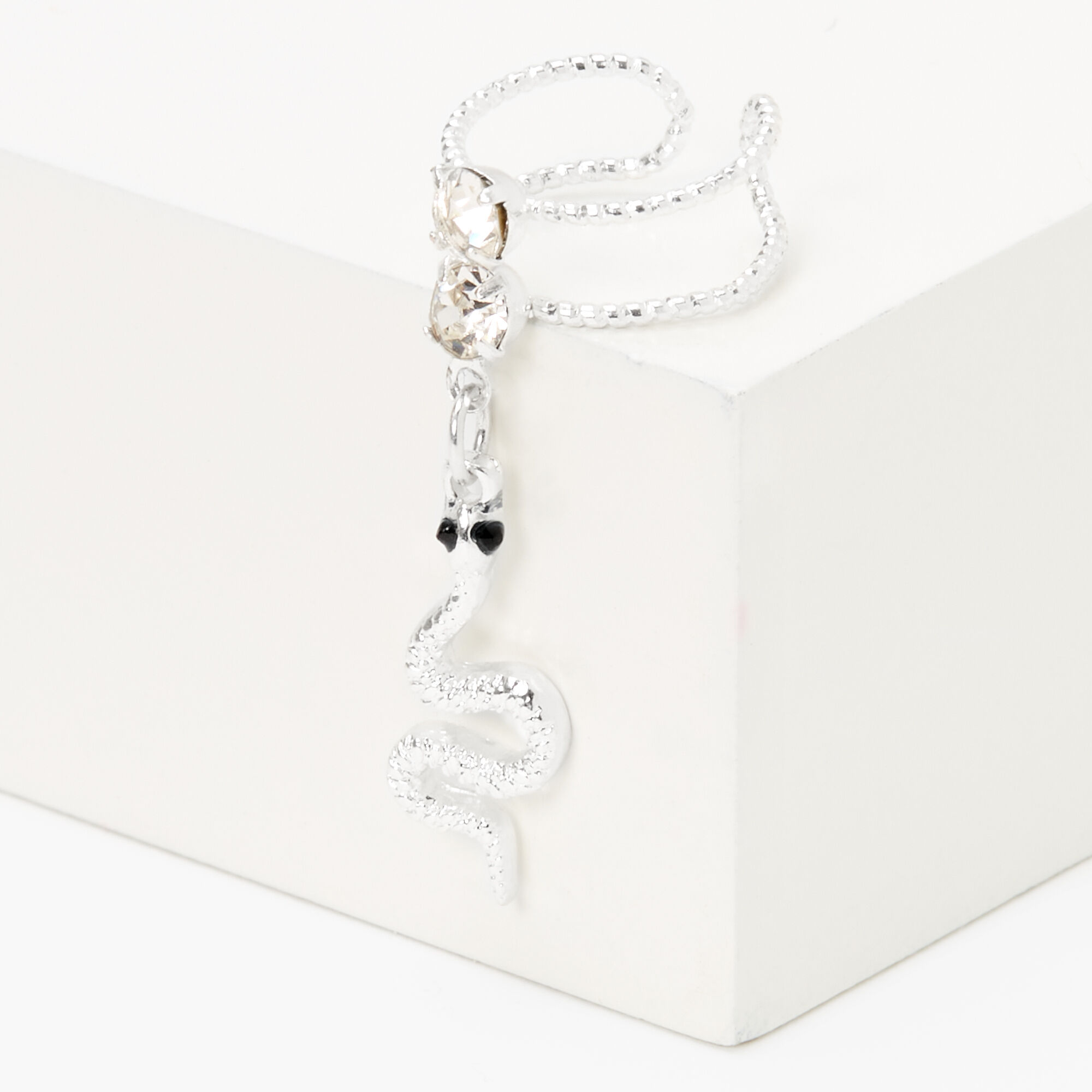 Claire's Manchette d'oreille à breloque serpent avec strass couleur argentée