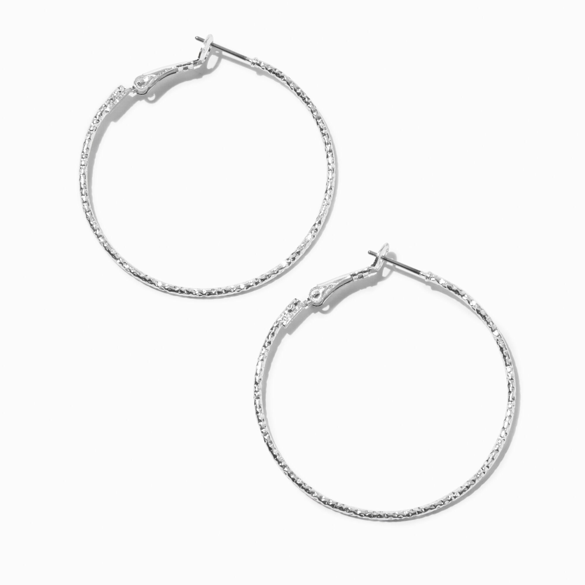 View Claires Tone 40MM Laser Cut Hoop Earrings Silver information
