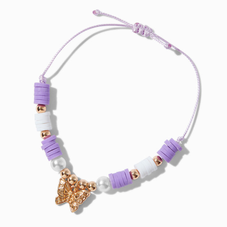 Bracelet r&eacute;glable papillon perl&eacute; violet couleur dor&eacute;e,