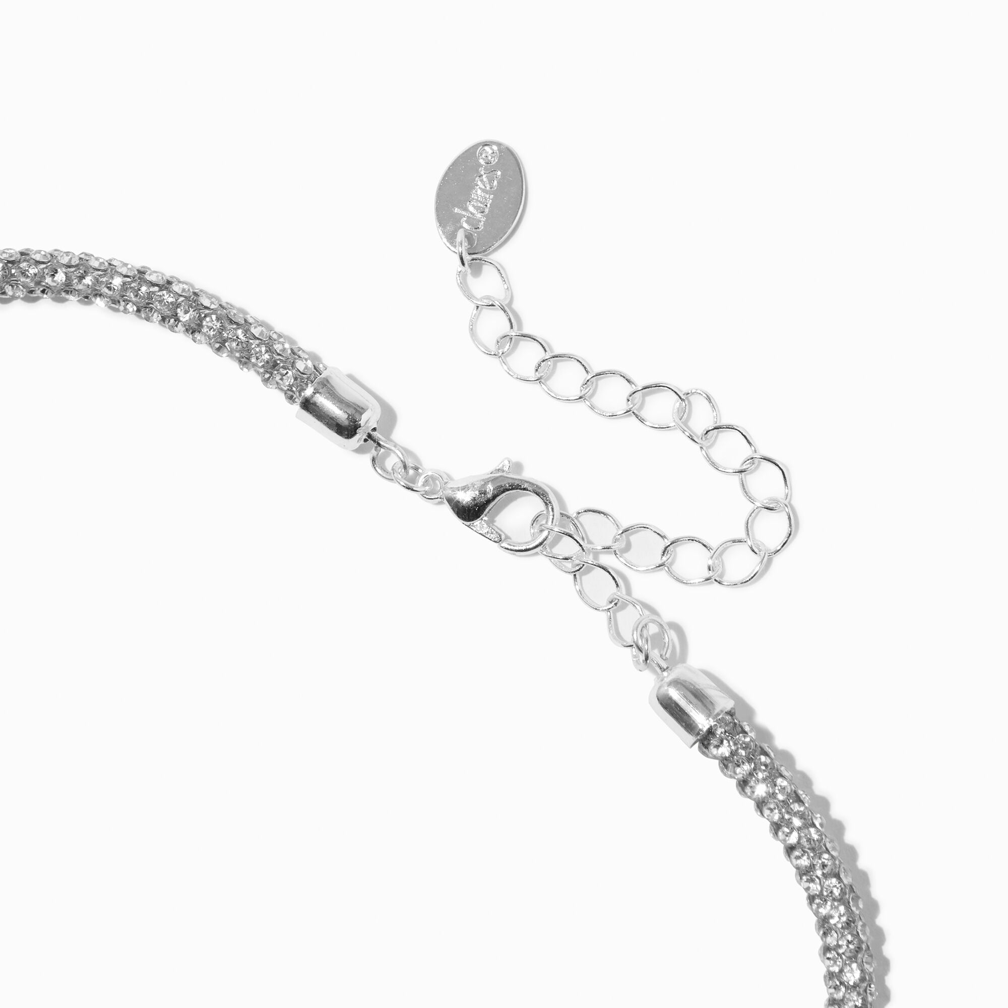 Collier imposant avec strass torsadé couleur argentée,
