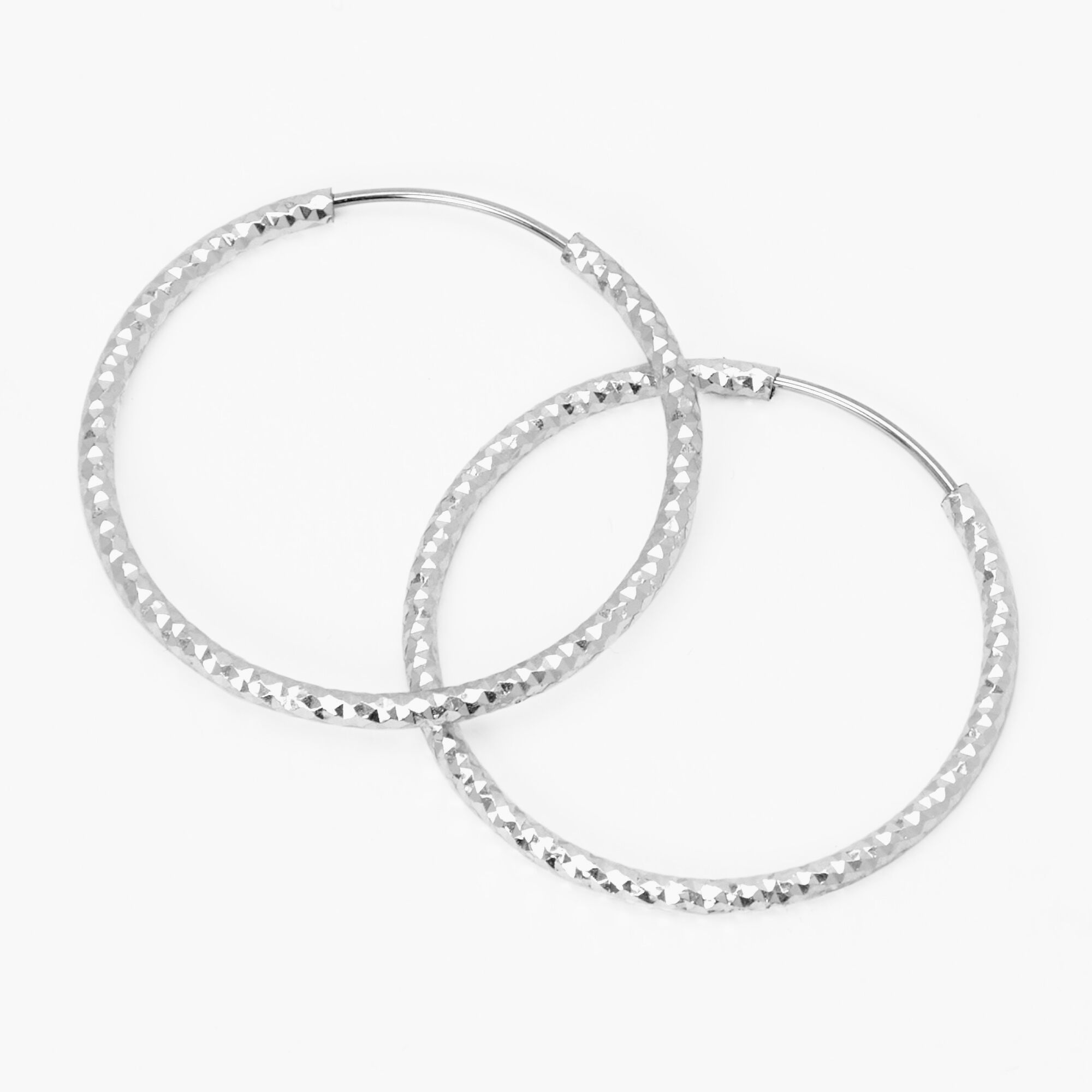 View Claires Tone Textured 25MM Hoop Earrings Silver information