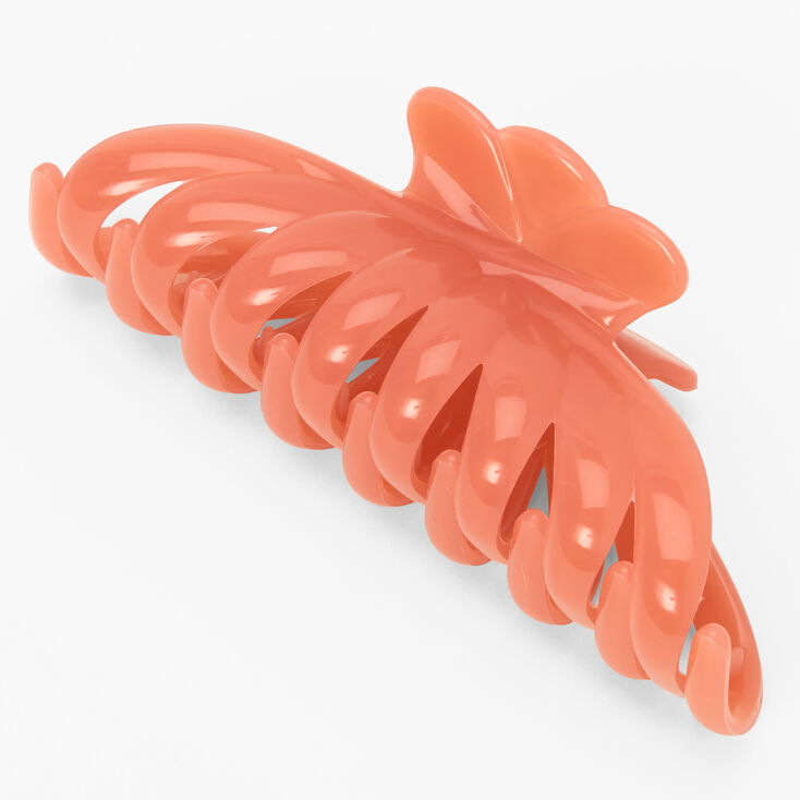 Grande pince &agrave; cheveux fleur couleur corail,