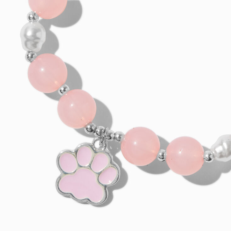 Bracelet &eacute;lastique perl&eacute; breloque patte de chien rose,