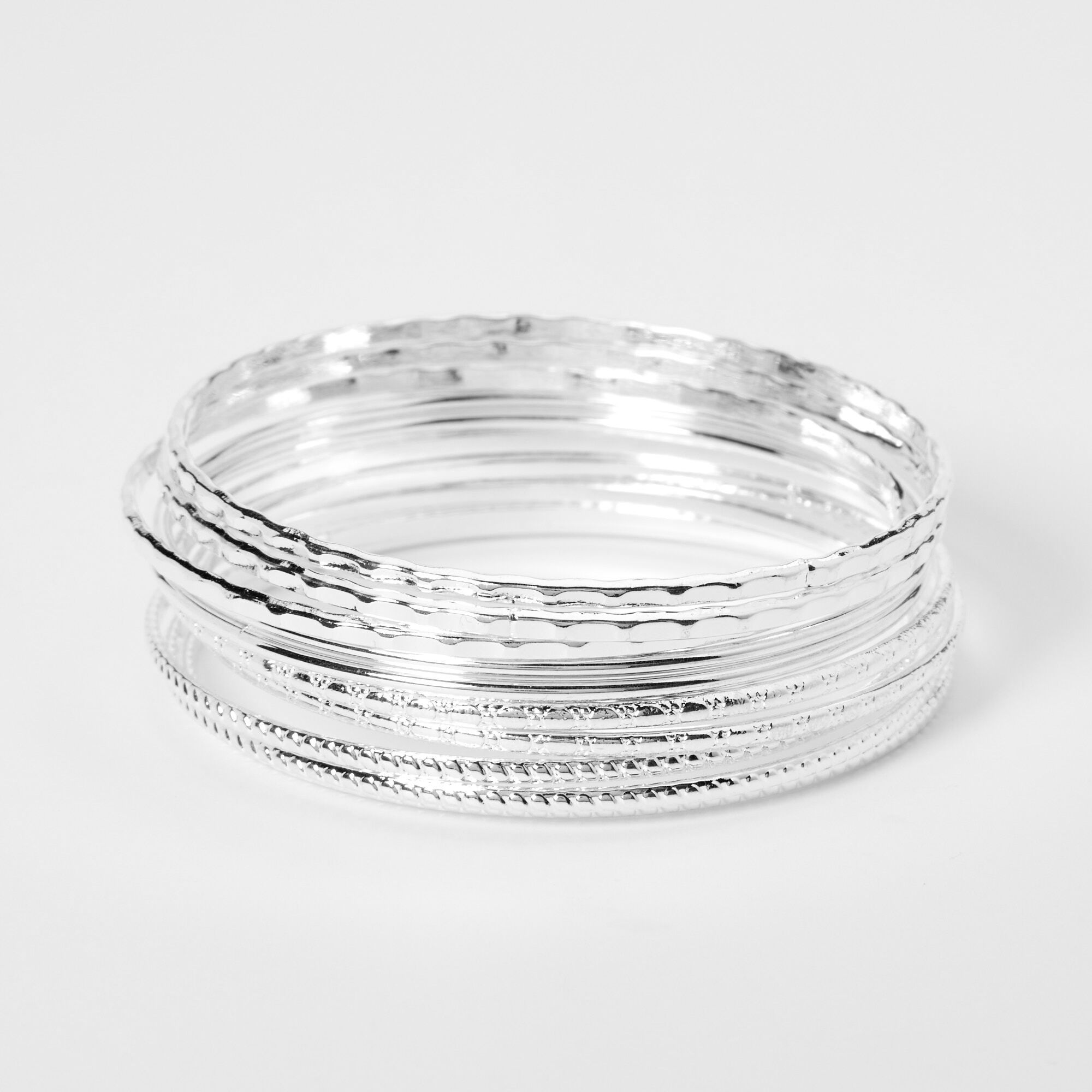 View Claires Tone Textured Bangle Bracelets 8 Pack Silver information