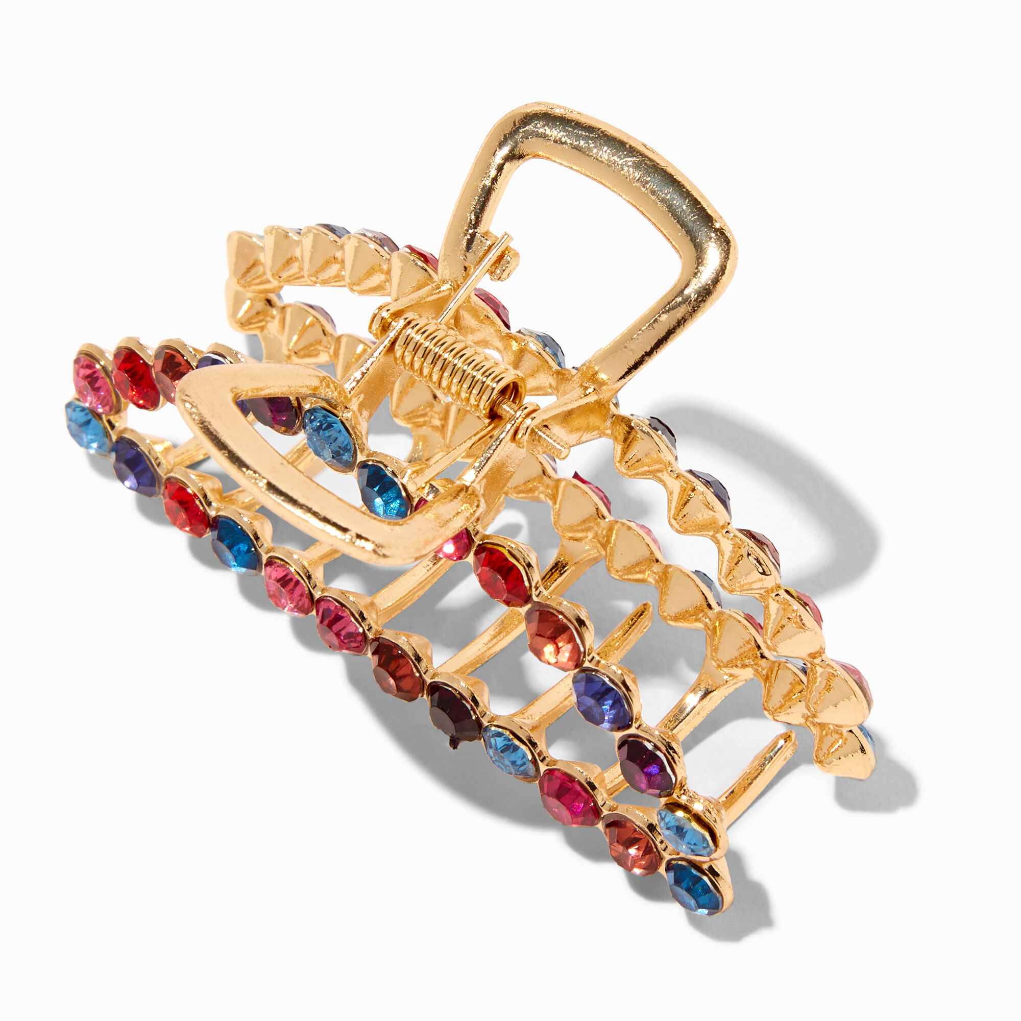 Pince à cheveux ovale bling bling aux tons bijoux couleur dorée,