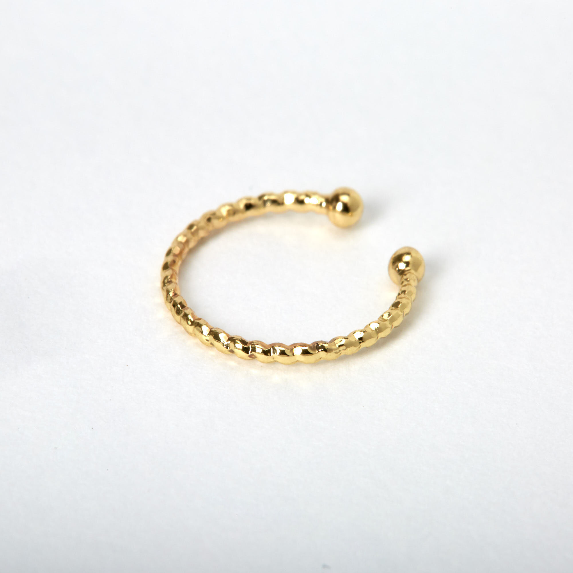 View Claires Tone Braided Faux Nose Ring Gold information