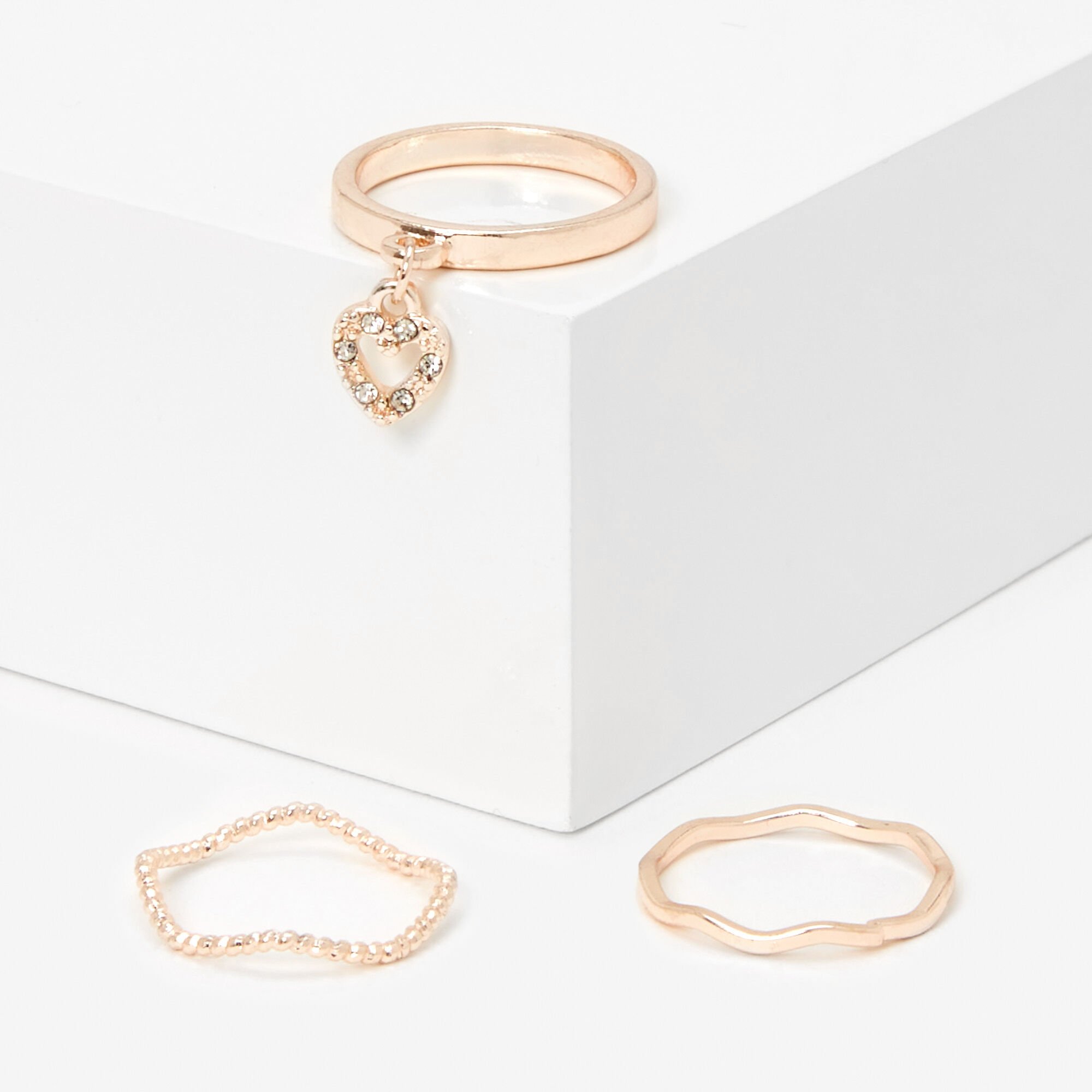 View Claires Tone Hearttextured Midi Rings 3 Pack Rose Gold information
