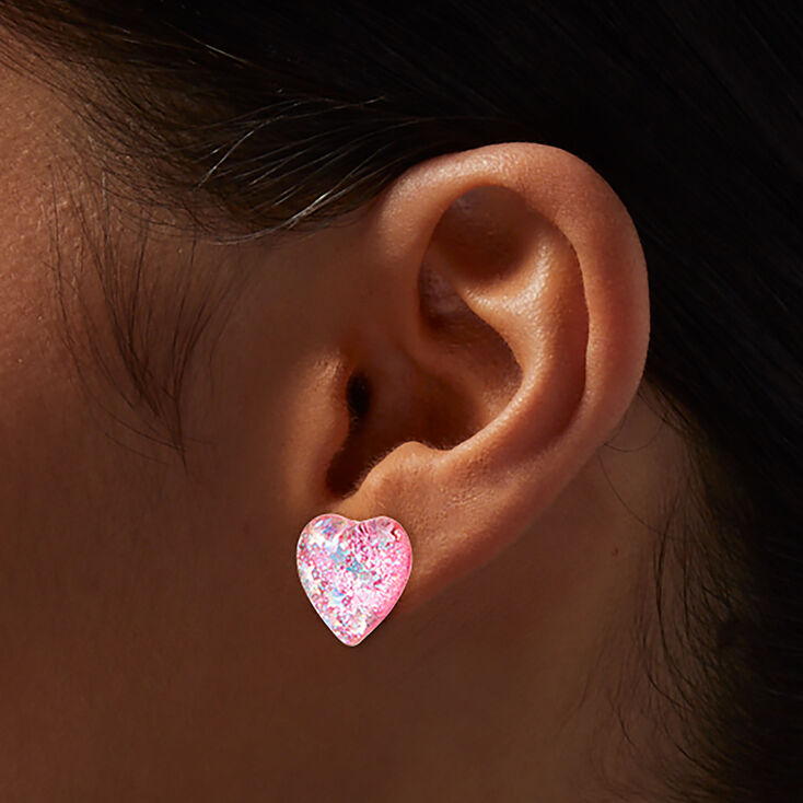 Clous d&#39;oreilles &agrave; c&oelig;ur rose &agrave; paillettes,