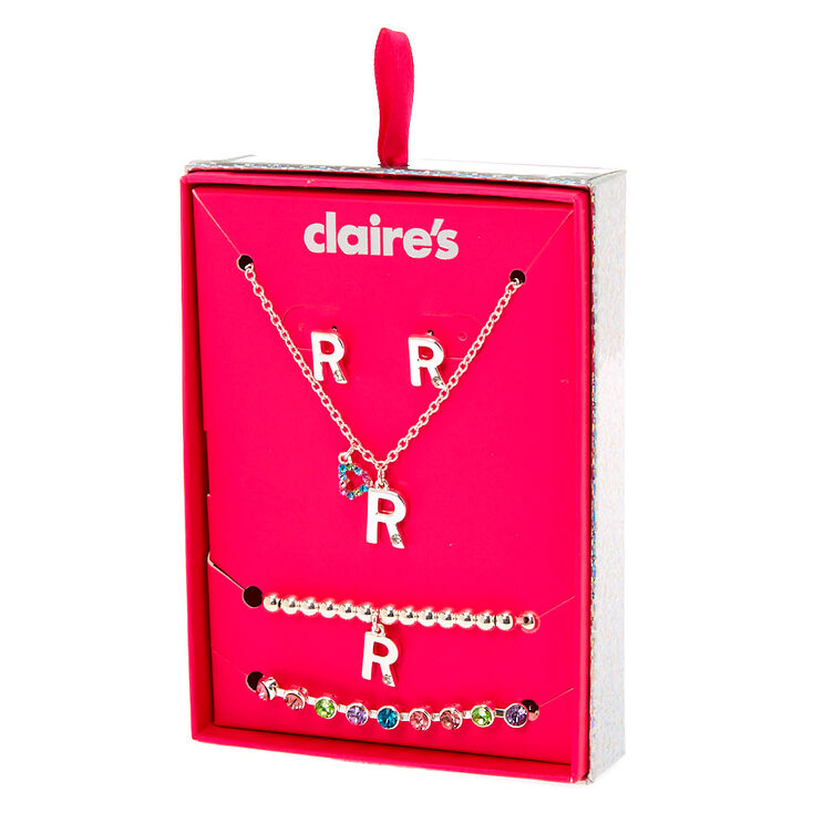 Claire's Coffret cadeau parure de bijoux à initiale R arc-en-ciel couleur argenté - Lot de 4