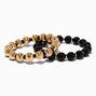 Bracelet &eacute;lastique perl&eacute; couleur dor&eacute;e textur&eacute; et noir,
