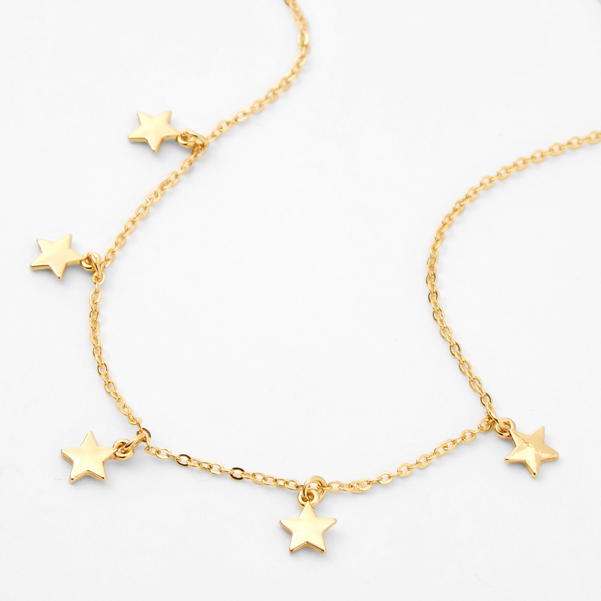 View Claires 18Ct Plated Star Refined Charm Necklace Gold information