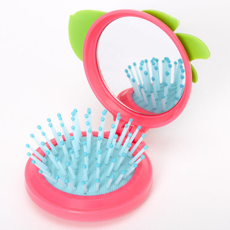 Claire's Brosse à cheveux rétractable tortue à paillettes - Rose