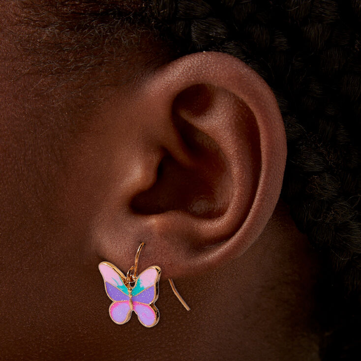 Pendantes papillon qui changent de couleur en r&eacute;action aux UV,