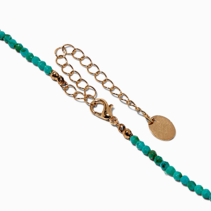Collier perl&eacute; couleur turquoise,