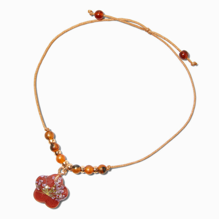 Bracelet bolo avec breloques marguerite fleur s&eacute;ch&eacute;e rouge,