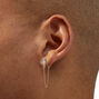 Boucles d&rsquo;oreilles reli&eacute;es par une cha&icirc;ne en zircon cubique couleur dor&eacute;e,