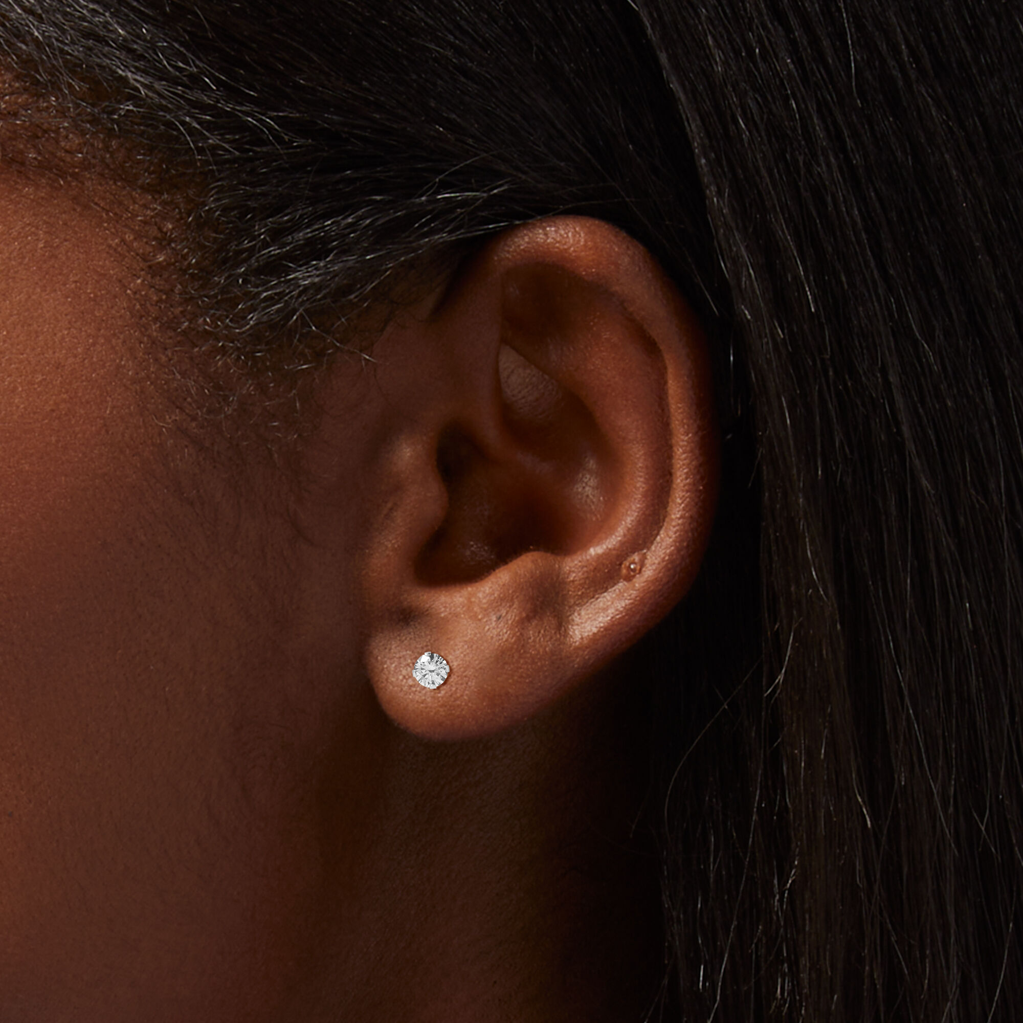 Claire's white gold earrings top