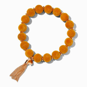 Bracelet &eacute;lastique &agrave; pompon couleur dor&eacute;e avec perles d&rsquo;imitation jaune moutarde,