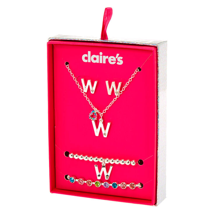 Claire's Coffret cadeau parure de bijoux à initiale W arc-en-ciel couleur argenté - Lot de 4