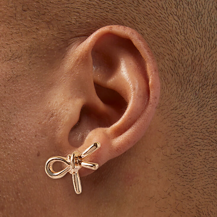 Clous d&#39;oreilles n&oelig;uds couleur dor&eacute;e,