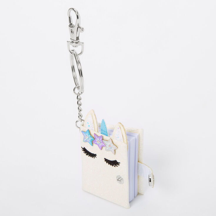 Claire's Mini porte-clés journal intime licorne à paillettes - Blanc