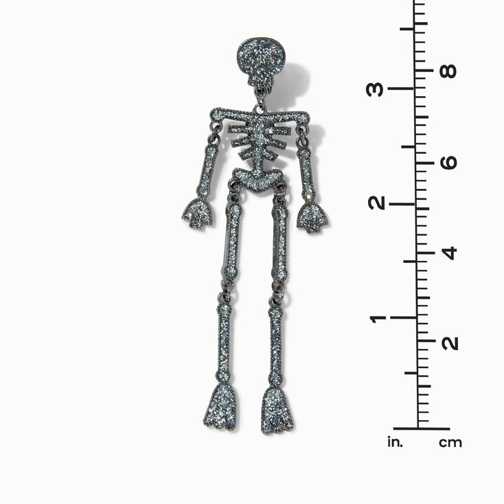 Pendantes &agrave; clip 10&nbsp;cm avec motif squelette articul&eacute; &agrave; paillettes,