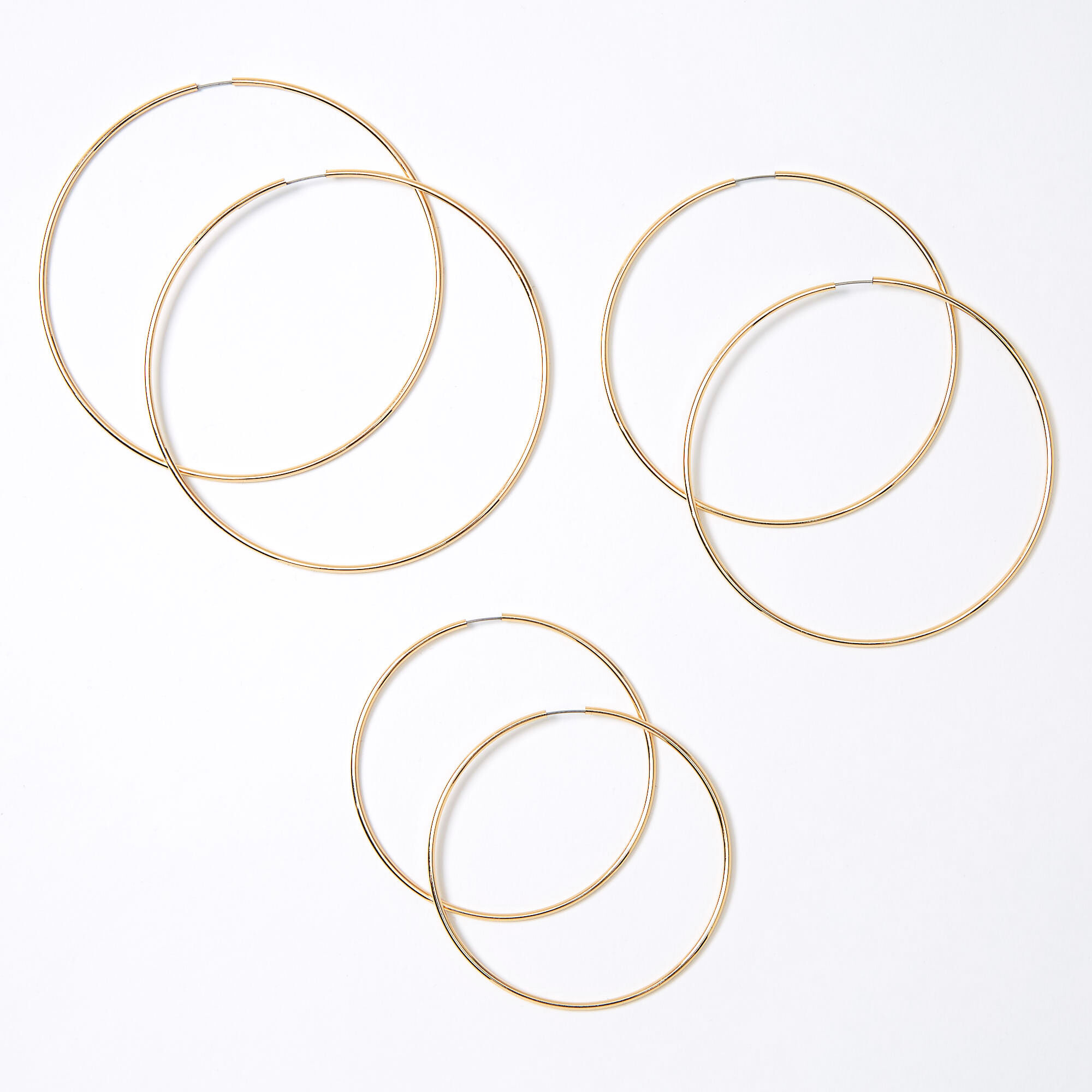 View Claires Tone Graduated Hoop Earrings 3 Pack Gold information