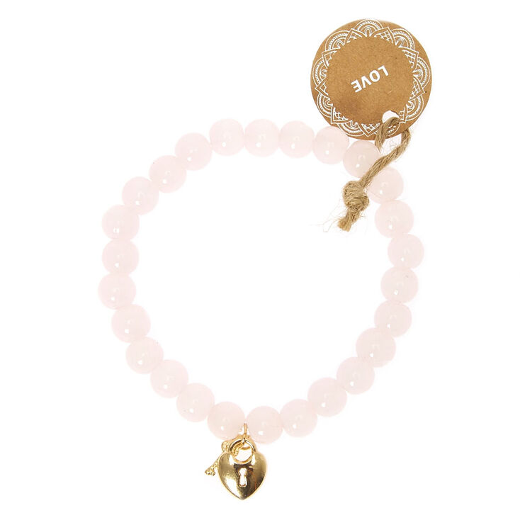 Claire's Bracelet élastique perlé love - Rose