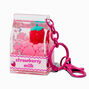 Porte-cl&eacute;s &agrave; paillettes rempli d&#39;eau lait fraise,