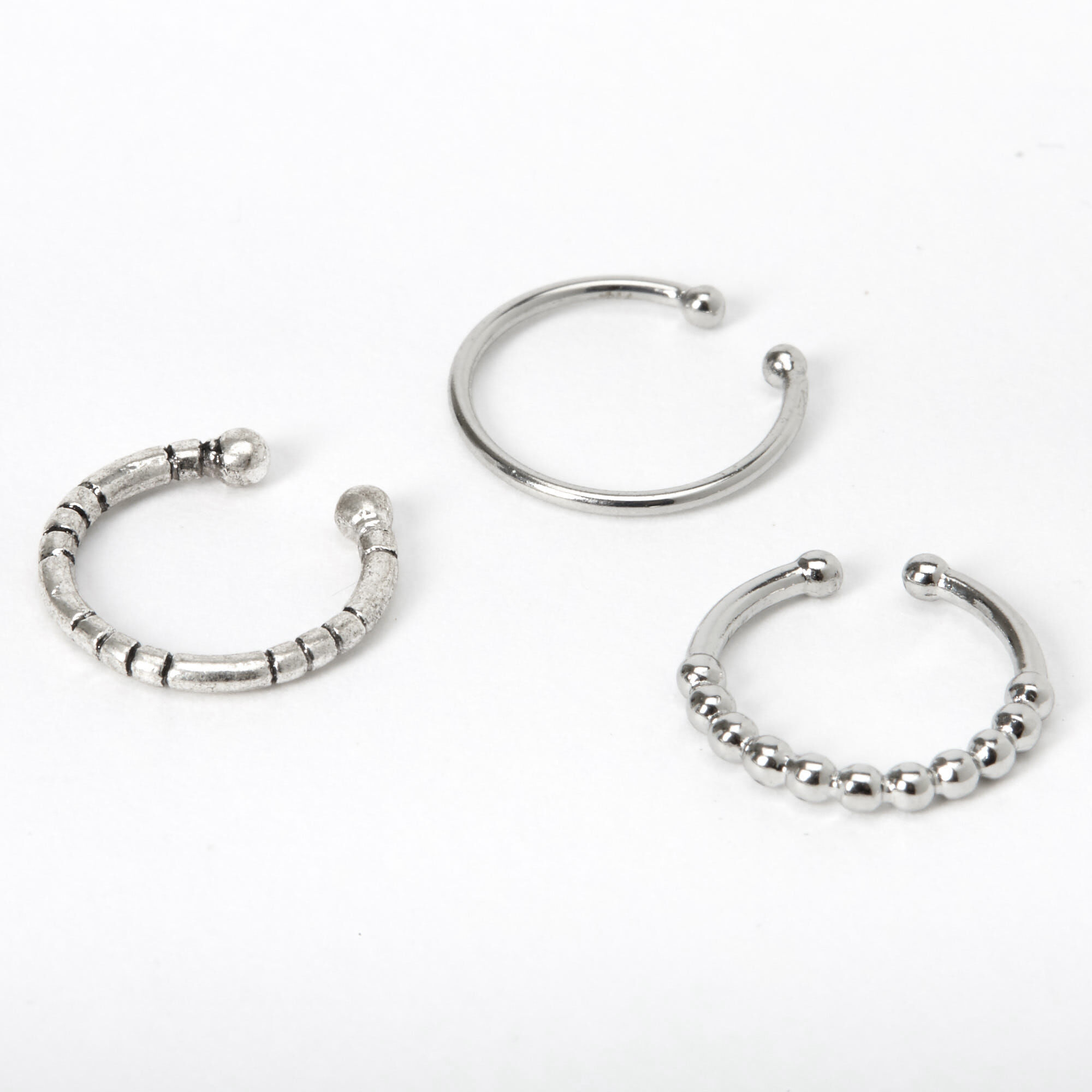 View Claires Tone Textured Faux Nose Rings 3 Pack Silver information